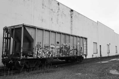 Train on railroad track against sky