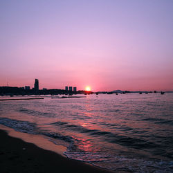 Scenic view of sea against sky during sunset