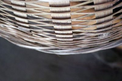 Close-up of stack of metal in wicker basket