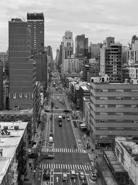 High angle view of street amidst buildings in city