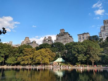 Lake with buildings in background