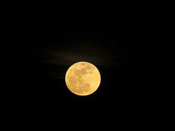 Low angle view of moon in sky