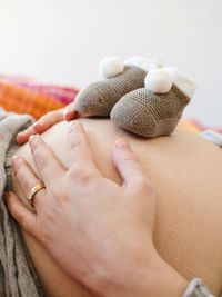 Close-up of woman holding hands