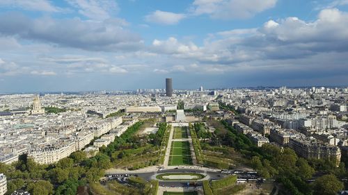 Aerial view of cityscape against sky