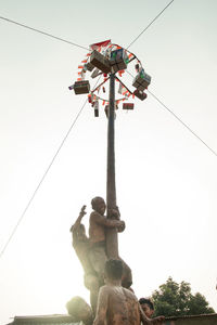 Low angle view of sculpture against clear sky