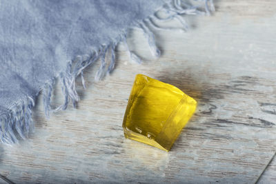 High angle view of yellow jelly on table