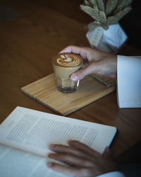 High angle view of coffee cup on table