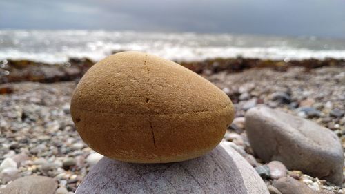 Close-up of stones on beach
