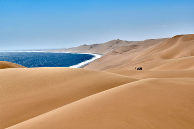 Scenic view of desert against sky