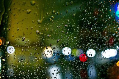 Close-up of water drops on glass