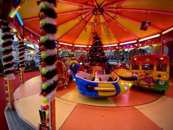 Illuminated ferris wheel at amusement park