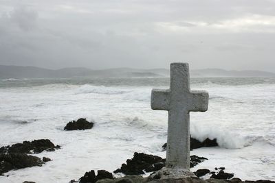 Scenic view of sea against sky during winter