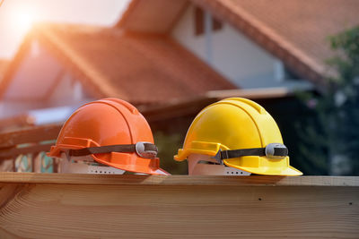 Close-up of yellow working at construction site