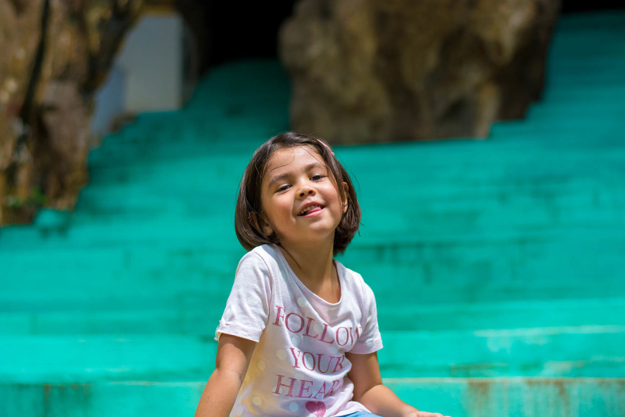 PORTRAIT OF A SMILING GIRL