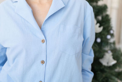 Midsection of woman standing outdoors