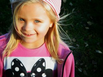 Close-up portrait of smiling cute girl