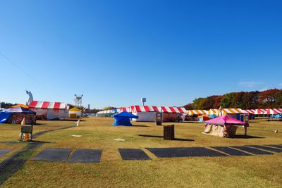 View of landscape against clear blue sky