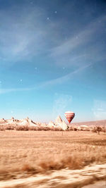 View of hot air balloon in desert