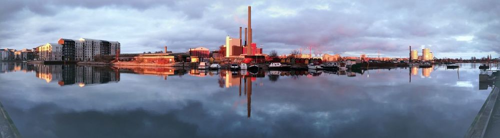 Panoramic view of factory against sky