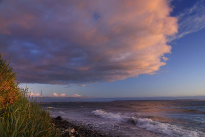 Scenic view of sea against sky during sunset