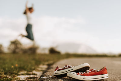 Close-up of toy shoes on field