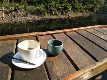 High angle view of coffee cup on table