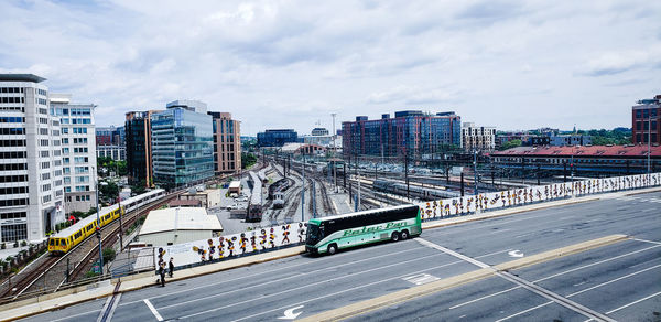 High angle view of vehicles on road against sky