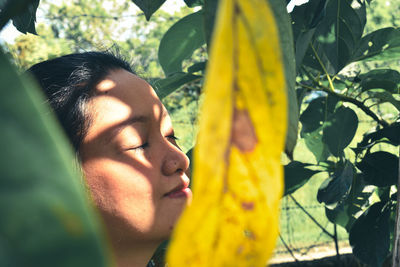 Close-up portrait of young woman