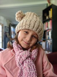 Portrait of cute girl wearing hat