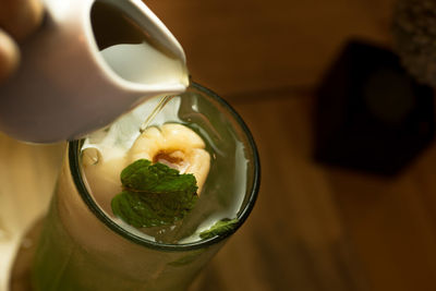 Close-up of drink served on table