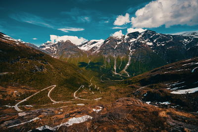 Scenic view of snowcapped mountains against sky