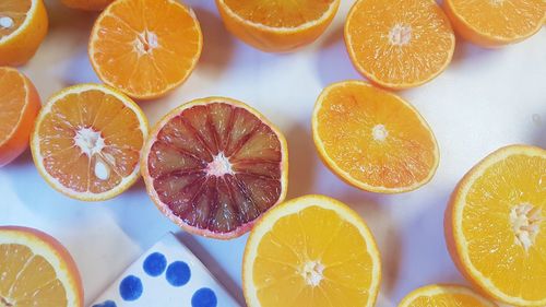 Directly above shot of orange fruits on table