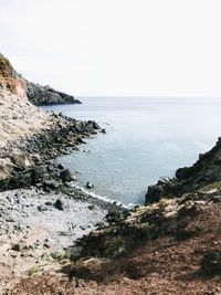 Scenic view of sea against clear sky