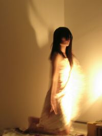 Close-up of woman standing in pond