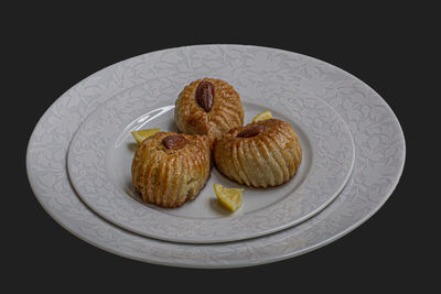 High angle view of fruits in plate on table