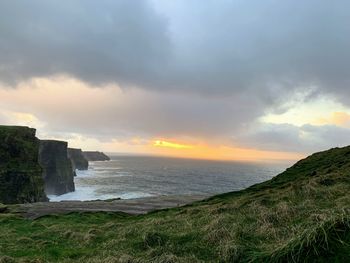 Scenic view of sea against sky during sunset