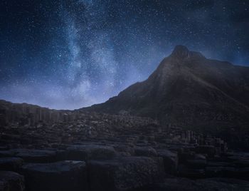 Mountain against sky at night