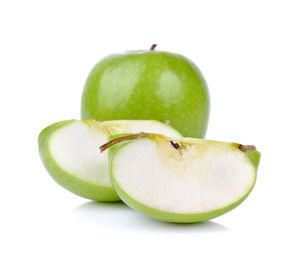 Close-up of apple against white background