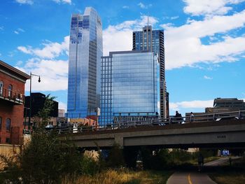 Modern buildings against sky in city