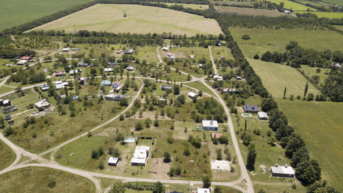 High angle view of buildings on field