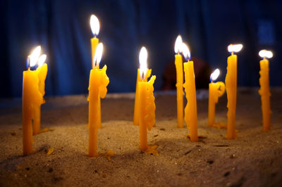 Close-up of burning candles