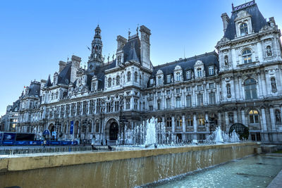 Low angle view of buildings against sky