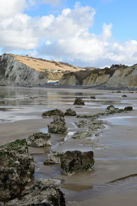 Scenic view of beach against sky