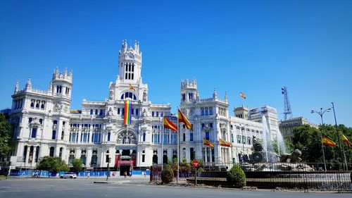 Low angle view of building against blue sky