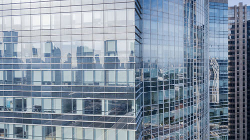 Full frame shot of glass building in city