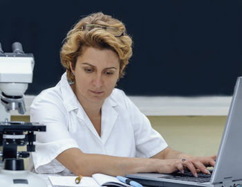 Portrait of senior woman using mobile phone