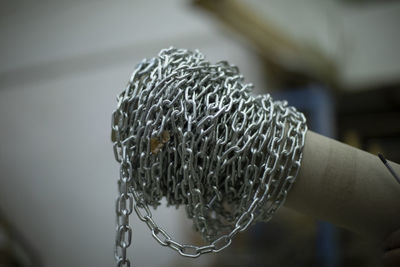 Steel chain wound on stick. high strength steel chain. industrial item. 