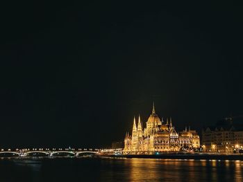 Illuminated city lit up at night