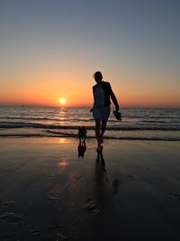 Full length of a young couple on beach