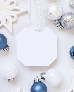 High angle view of white and paper on table